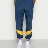 Adidas Originals RIPSTOP TRACK - Tracksuit Bottoms - Collegiate Navy
