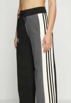 Adidas Originals WIDE LEG - Tracksuit Bottoms - Black -Adidas Originals Shop 002d1ae6a8cc486588b2908d97c3d6a3