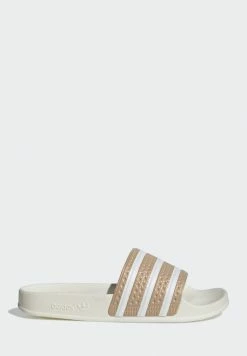 Adidas Originals ADILETTE UNISEX - Mules - Magic Beige/ftwr White/off White -Adidas Originals Shop 09b22fea07234d3e9e6077662fe64666