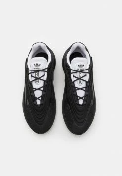 Adidas Originals OZELIA UNISEX - Trainers - Core Black/footwear White -Adidas Originals Shop 0ebdd316029644e3adc72f4786fba649