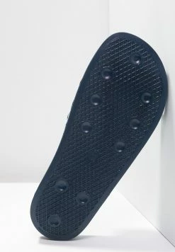 Adidas Originals ADILETTE UNISEX - Mules - Blue/white -Adidas Originals Shop 0fe1165e40784628b182a3c88f35cf8a