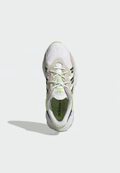 Adidas Originals OZWEEGO MANCHESTER UNITED - Trainers - White -Adidas Originals Shop 148ce08e94d745c38fd34b9ead7ea8a8