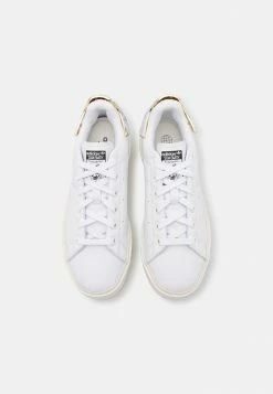 Adidas Originals STAN SMITH BONEGA - Trainers - Footwear White/gold Metallic -Adidas Originals Shop 1a3a73c89fb34d0693c49296433f00f3
