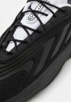 Adidas Originals OZELIA UNISEX - Trainers - Core Black/footwear White -Adidas Originals Shop 1bc8472b97fe4ab9bfc91365673b442a