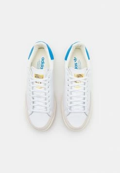 Adidas Originals ROD LAVER UNISEX - Trainers - Footwear White/blue Rush -Adidas Originals Shop 237552c728804fcf832e8712e27b73a3