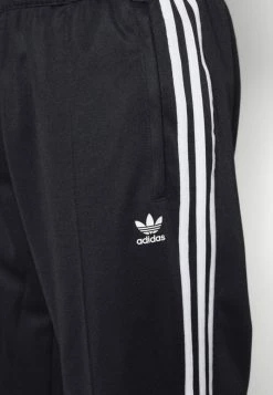 Adidas Originals TRACK PANTS UNISEX - Tracksuit Bottoms - Black -Adidas Originals Shop 25e92949e295486bbc584bb3830e89c9
