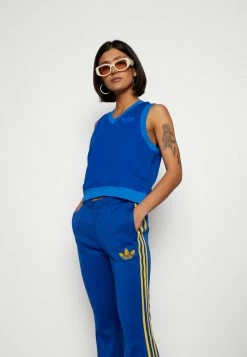 Adidas Originals FLARED 70S PACK - Tracksuit Bottoms - Collegiate Royal -Adidas Originals Shop 2c4bf7ee6bbc41c896a85e1f31435bcc