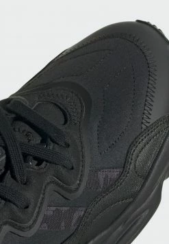 Adidas Originals OZWEEGO UNISEX - Trainers - Black -Adidas Originals Shop 2e70d03fd2f74d7dbf91ec8af41c9a46
