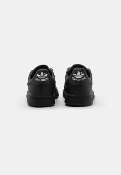 Adidas Originals STAN SMITH UNISEX - Trainers - Core Black/footwear White -Adidas Originals Shop 32909a6b2b6043ef998f97493a18dbf6