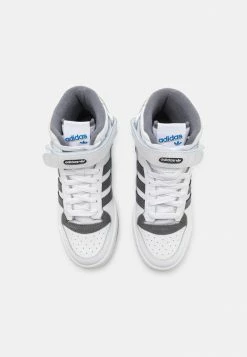 Adidas Originals FORUM MID UNISEX - Trainers - Footwear White/grey Five/gold Metallic -Adidas Originals Shop 362f74efded74bf8aed5a806b7171f52