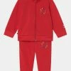 Adidas Originals TRACKSUIT SET UNISEX - Tracksuit - Vivid Red
