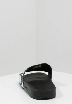 Adidas Originals ADILETTE UNISEX - Mules - Black/white -Adidas Originals Shop 3d4be3bd81b649388ffbdb4a1c9c55cf
