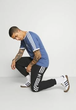 Adidas Originals LOCK UP UNISEX - Tracksuit Bottoms - Black -Adidas Originals Shop 434eacc7427d4c8280dcdf22bebad7a7