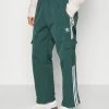Adidas Originals 3-STRIPES CARGO - Tracksuit Bottoms - Mineral Green