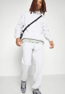 Adidas Originals ESS LOGO - Tracksuit Bottoms - Orbit Grey -Adidas Originals Shop 4a6250e1432547d8b7ce690cf7061995