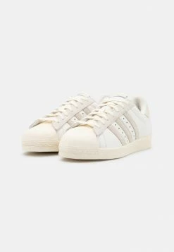 Adidas Originals SUPERSTAR 82 UNISEX - Trainers - Cloud White/alumina/cream White -Adidas Originals Shop 4ad113f2c8da498abf1884027ef44fe5