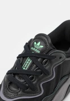 Adidas Originals OZWEEGO UNISEX - Trainers - Black -Adidas Originals Shop 527c263113ab404fb50ce4b47670cef2