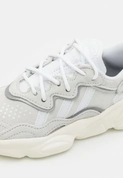 Adidas Originals OZWEEGO UNISEX - Trainers - Crystal White/footwear White/offwhite -Adidas Originals Shop 537bffd032af48ad9fcf2057f4c70c67
