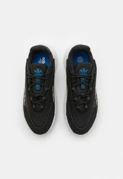 Adidas Originals OZELIA UNISEX - Trainers - Core Black/footwear White/blue -Adidas Originals Shop 5ca08a6545bd4e7f8104d7bc50dd96c9