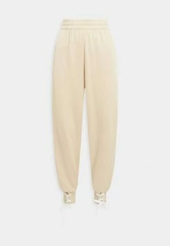 Adidas Originals CUFFED PANT - Tracksuit Bottoms - Magic Beige -Adidas Originals Shop 6219f94484c641a4b400df3c36f5f6dd