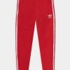 Adidas Originals TRACK PANTS UNISEX - Tracksuit Bottoms - Vivid Red/white