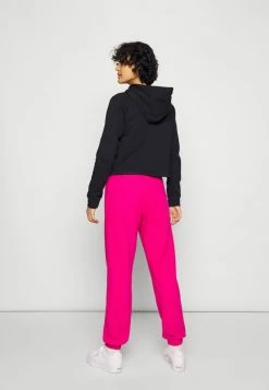 Adidas Originals CUFFED PANT - Tracksuit Bottoms - Real Magenta -Adidas Originals Shop 6dc443c8b4fd4c678015f9c91b9f495b