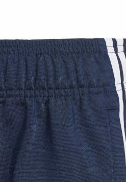 Adidas Originals TRACK PANTS UNISEX - Tracksuit Bottoms - Night Indigo -Adidas Originals Shop 6e235d58dc2f471baa9adf860a913373