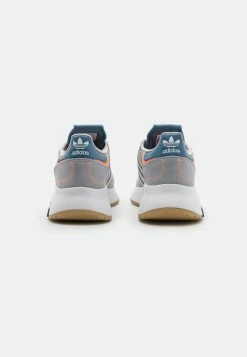 Adidas Originals RETROPY F2 UNISEX - Trainers - Grey Two/grey One/halo Silver -Adidas Originals Shop 6f572febfd6047afb8e4809e54c23c22