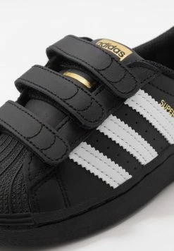 Adidas Originals SUPERSTAR - Trainers - Core Black/footwear White -Adidas Originals Shop 717818ca441f4334a990d833fd334dff