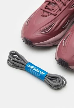 Adidas Originals OZWEEGO CELOX UNISEX - Trainers - Quiet Crimson/oxide/core Black -Adidas Originals Shop 796899947bc14b0e8121b232908a7068