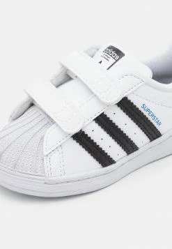 Adidas Originals SUPERSTAR UNISEX - Trainers - Footwear White/core Black/blue -Adidas Originals Shop 7ace22f9a68540ada0beb70c2bef3bbf