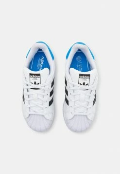 Adidas Originals SUPERSTAR C UNISEX - Trainers - Footwear White/core Black/blue Rush -Adidas Originals Shop 7ca0107919054f7fa2c5a66941ab24f5