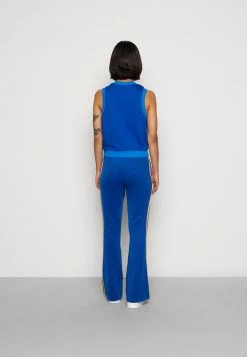 Adidas Originals FLARED 70S PACK - Tracksuit Bottoms - Collegiate Royal -Adidas Originals Shop 80951d94fa6b45a3bc639989d191006a