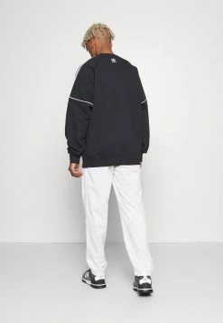 Adidas Originals STRAIGHT - Tracksuit Bottoms - Off-white -Adidas Originals Shop 8411c08407d74fd1b0a87f509f048f74