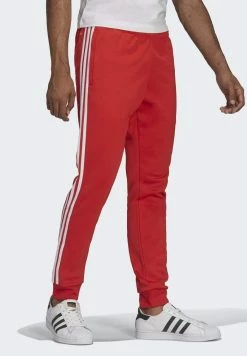 Adidas Originals ADICOLOR CLASSICS SUPERSTAR - Tracksuit Bottoms - Red -Adidas Originals Shop 85d82b50b79f404da1b9d66ee42c0e0a