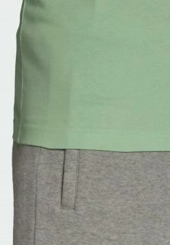 Adidas Originals ESSENTIAL TEE - Basic T-shirt - Green -Adidas Originals Shop 8d822351e7a7493a93f88a319f479106