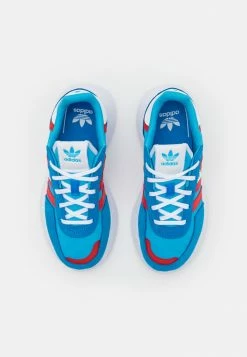 Adidas Originals RETROPY UNISEX - Trainers - App Sky Rush/vivid Red/blue Rush -Adidas Originals Shop 8f88aa2041fc4a5088735c7fdd577163