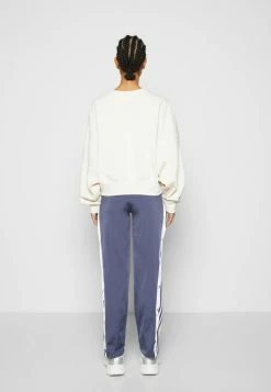 Adidas Originals ADICOLOR CLASSICS ADIBREAK - Tracksuit Bottoms - Shadow Navy -Adidas Originals Shop 904b4612ec344831852ba0d58d99d2c9