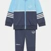Adidas Originals TRACKSUIT UNISEX - Tracksuit - Clear Sky/shadow Navy