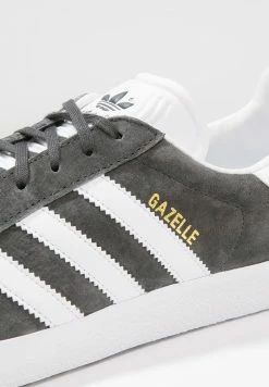 Adidas Originals GAZELLE - Trainers - Dgsogr/white/goldmt -Adidas Originals Shop 9d132d75b3b84e69ba8798e2dd63ff90