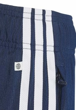 Adidas Originals TRACK PANTS UNISEX - Tracksuit Bottoms - Night Indigo -Adidas Originals Shop 9d327ed8a481424f93fbcb3530c11c9b