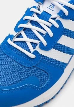 Adidas Originals ZX UNISEX - Trainers - Blue/footwear White -Adidas Originals Shop a15f2f688ef14339b77f65e289d7ceab