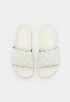 Adidas Originals ADILETTE UNISEX - Mules - Off White/footwear White -Adidas Originals Shop a30b48ed6e9d458185c80d24f4fed4d4