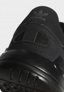 Adidas Originals LA TRAINER LITE SHOES - Trainers - Black -Adidas Originals Shop abcc3bf063fb4b569f97f65397a73960