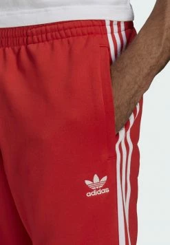 Adidas Originals ADICOLOR CLASSICS SUPERSTAR - Tracksuit Bottoms - Red -Adidas Originals Shop ad1d273e3e824a23bc57b7567e56706c