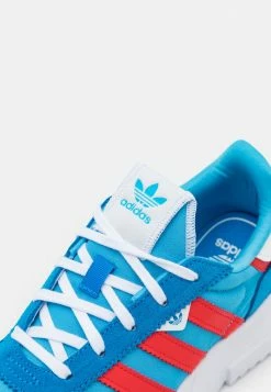 Adidas Originals RETROPY UNISEX - Trainers - App Sky Rush/vivid Red/blue Rush -Adidas Originals Shop adb565ee862f45e5a9b1c40e455f659f
