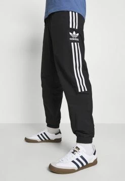 Adidas Originals LOCK UP UNISEX - Tracksuit Bottoms - Black -Adidas Originals Shop aee31f7a66a3423e8409187c389e45df