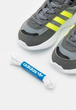 Adidas Originals RETROPY F2 UNISEX - Trainers - Grey Three/solar Yellow/grey Five -Adidas Originals Shop b34981a5766649e99ff49e290832d68b