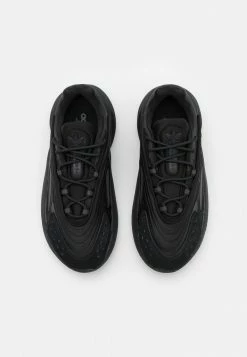 Adidas Originals OZELIA UNISEX - Trainers - Core Black/carbon -Adidas Originals Shop b3945102fced4fb49c7a2225ce634cca