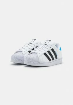 Adidas Originals SUPERSTAR C UNISEX - Trainers - Footwear White/core Black/blue Rush -Adidas Originals Shop b70afb7c3e944136af31d053e204e053